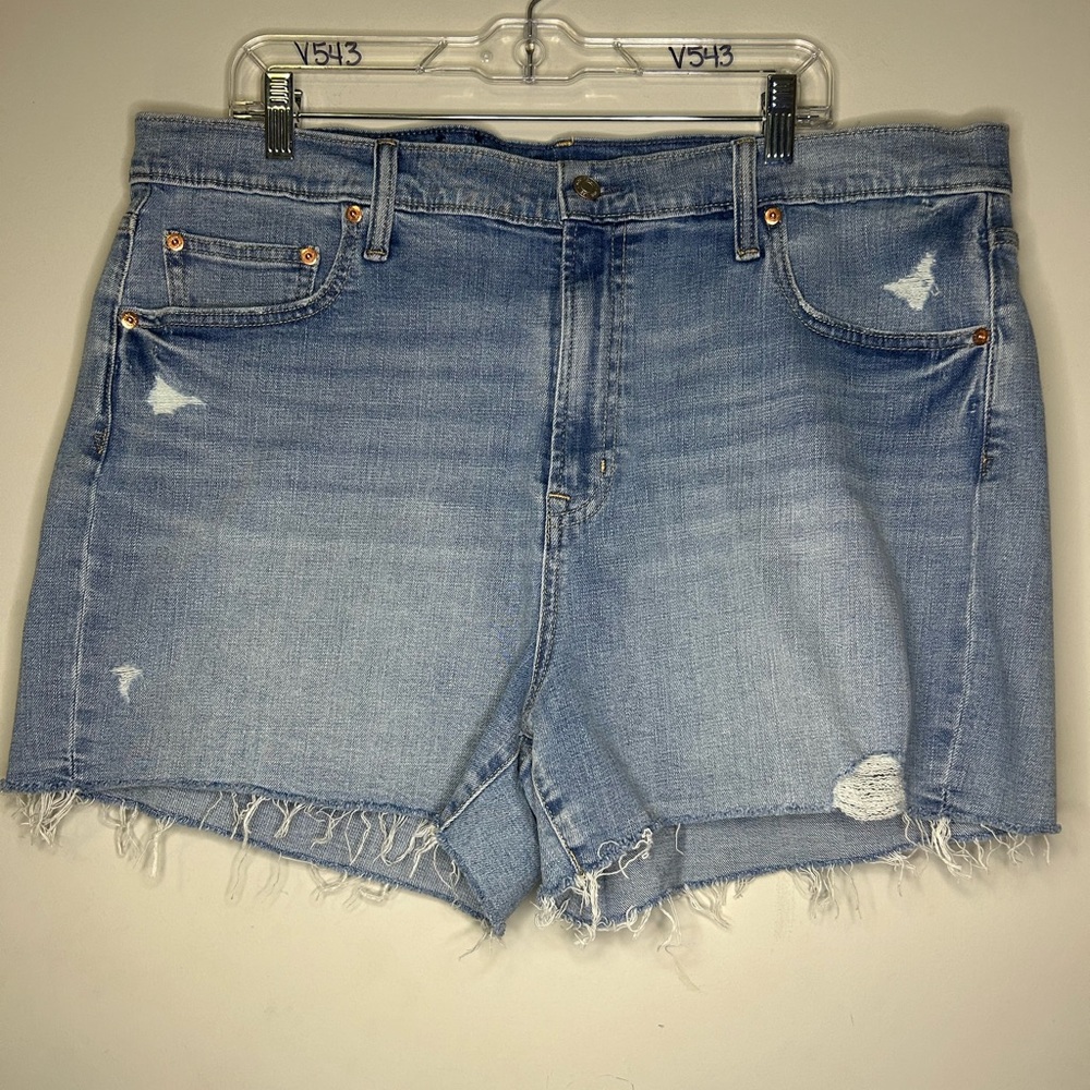 GAP 4” Short High Rise size 35/ 20R light wash with distressing and raw hem